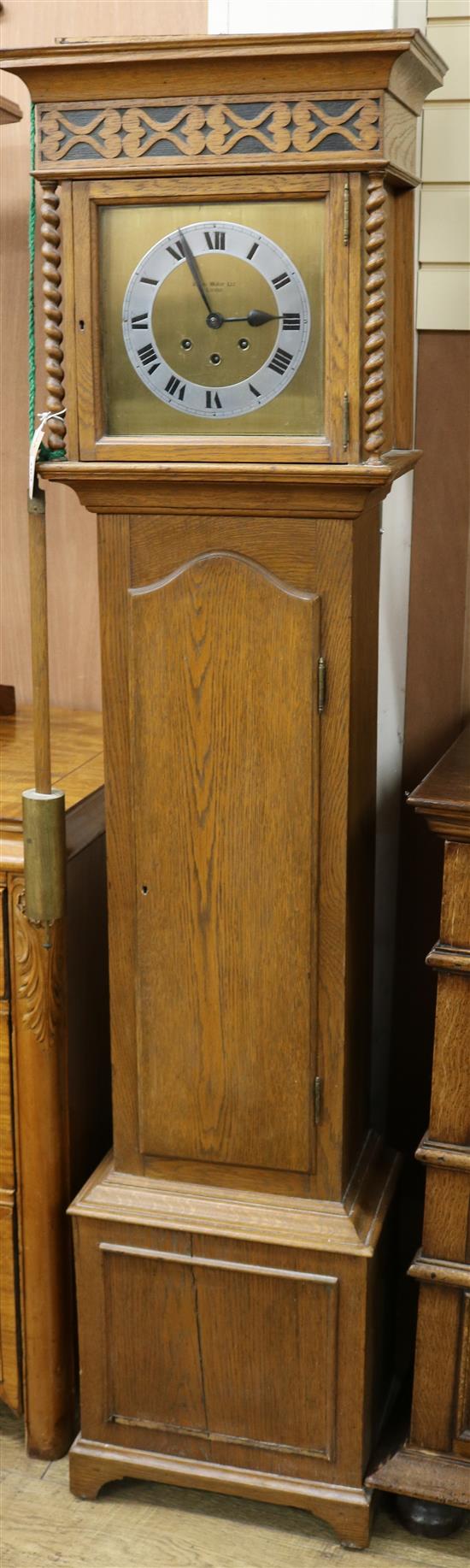 James Walker Ltd. An oak chiming grandmother clock H.167.5cm